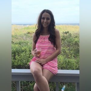 Pink striped holder romper.